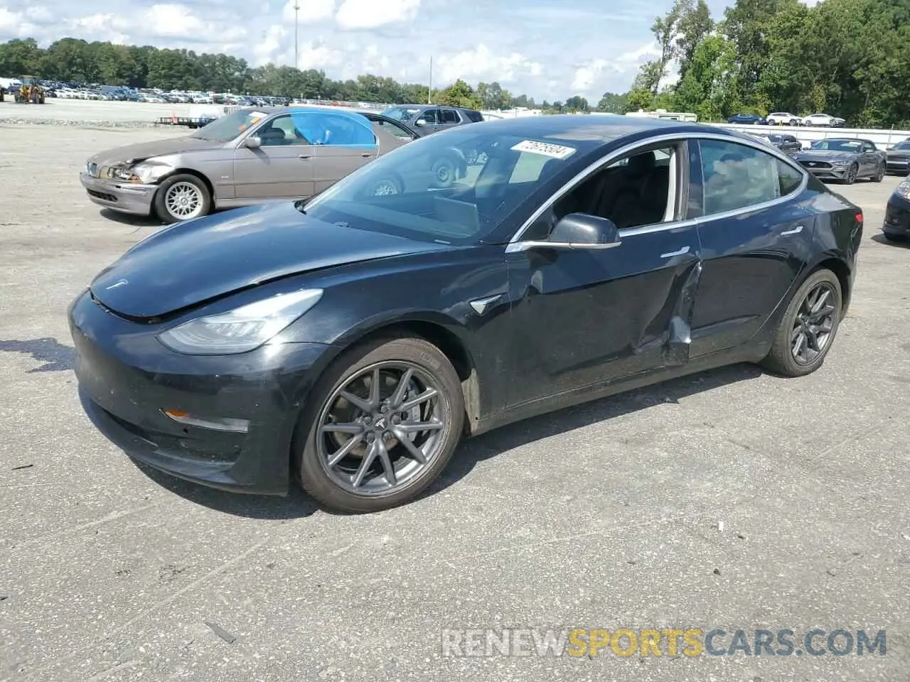 1 Photograph of a damaged car 5YJ3E1EB4KF385727 TESLA MODEL 3 2019