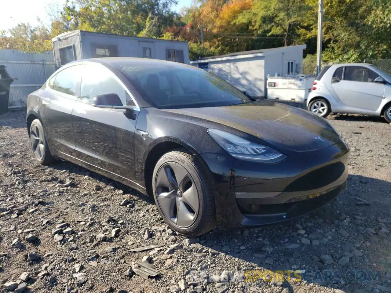 4 Photograph of a damaged car 5YJ3E1EB4KF386117 TESLA MODEL 3 2019