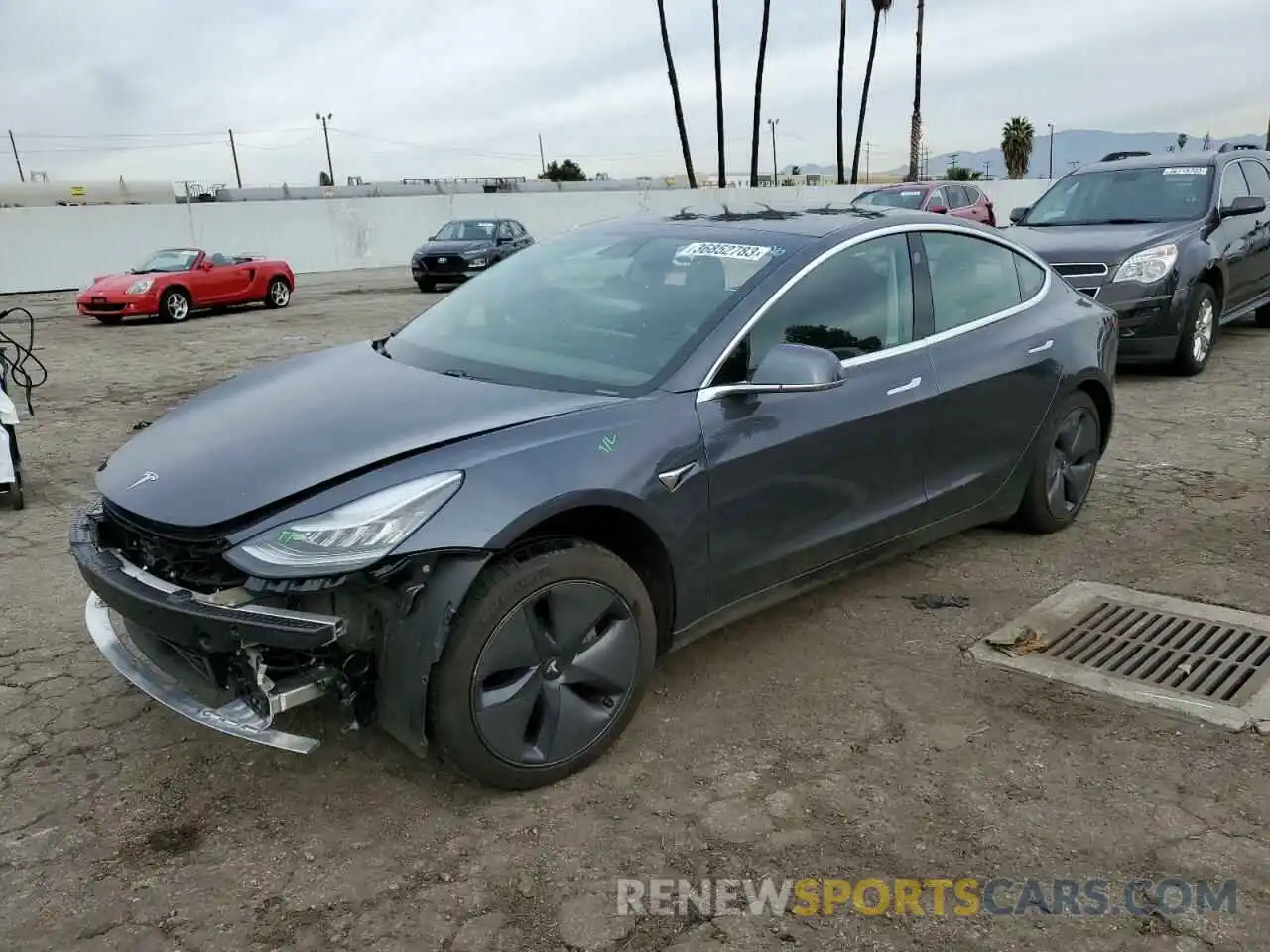 1 Photograph of a damaged car 5YJ3E1EB4KF386697 TESLA MODEL 3 2019