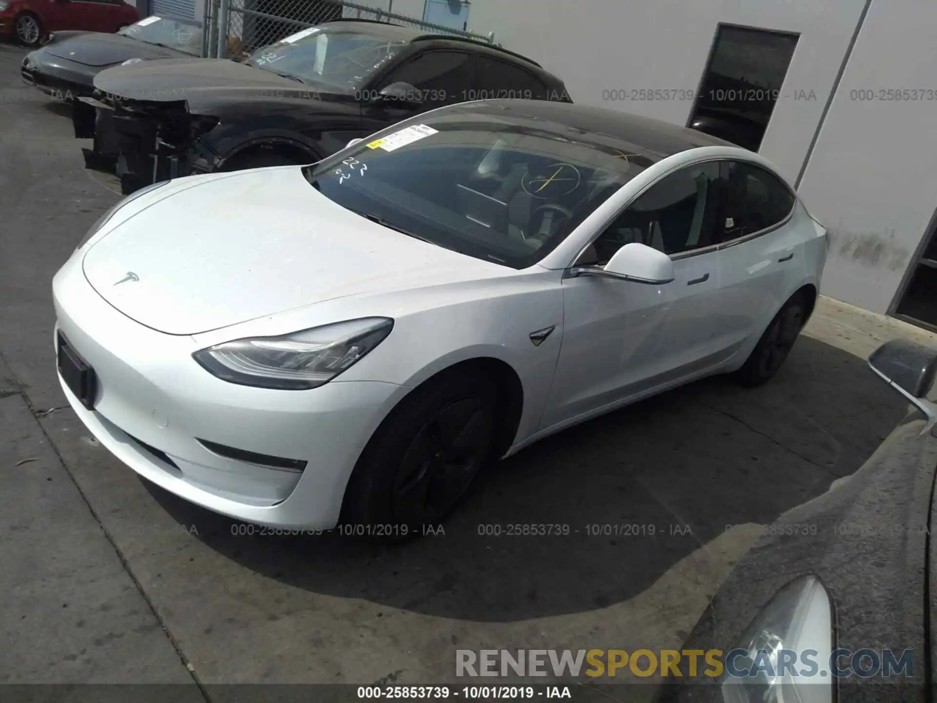 2 Photograph of a damaged car 5YJ3E1EB4KF388059 TESLA MODEL 3 2019