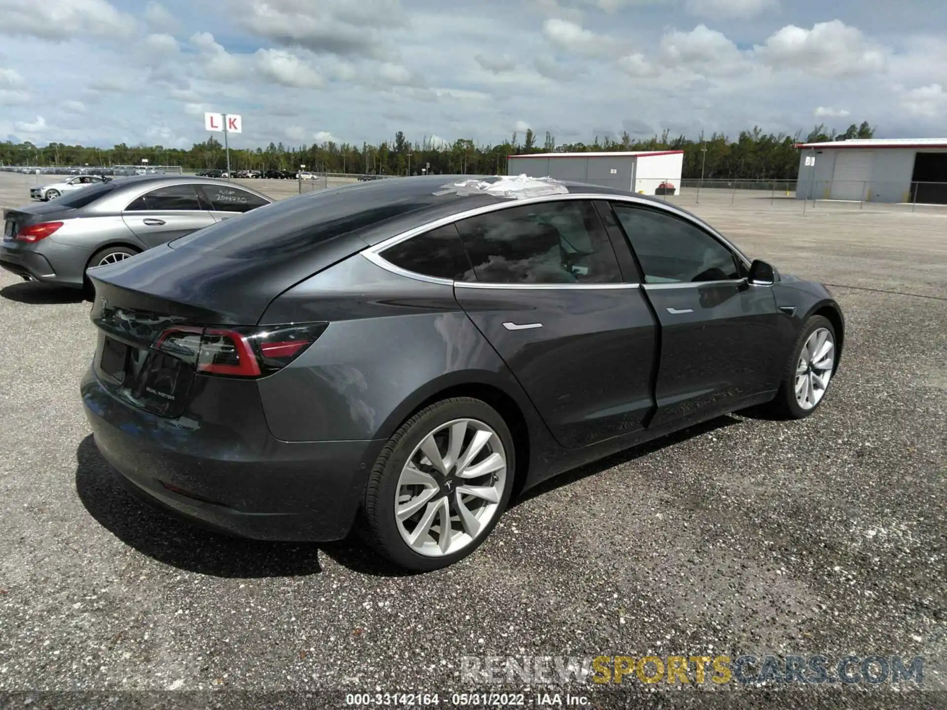 4 Photograph of a damaged car 5YJ3E1EB4KF391754 TESLA MODEL 3 2019