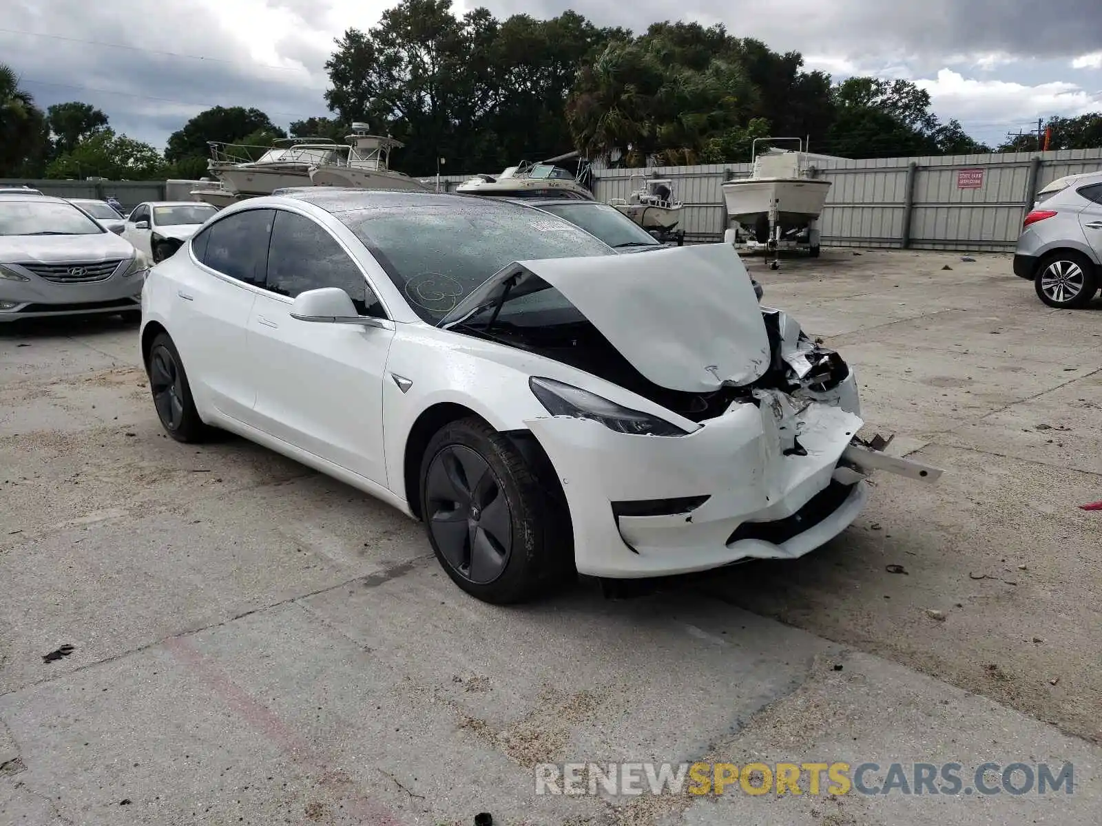 1 Photograph of a damaged car 5YJ3E1EB4KF441875 TESLA MODEL 3 2019