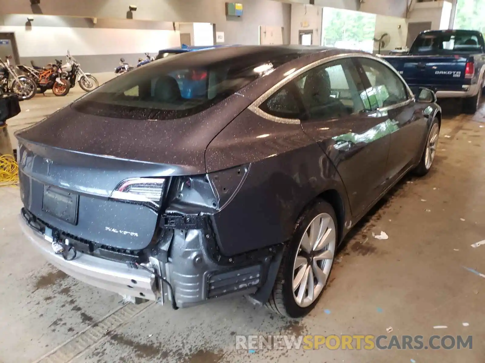 4 Photograph of a damaged car 5YJ3E1EB4KF477453 TESLA MODEL 3 2019