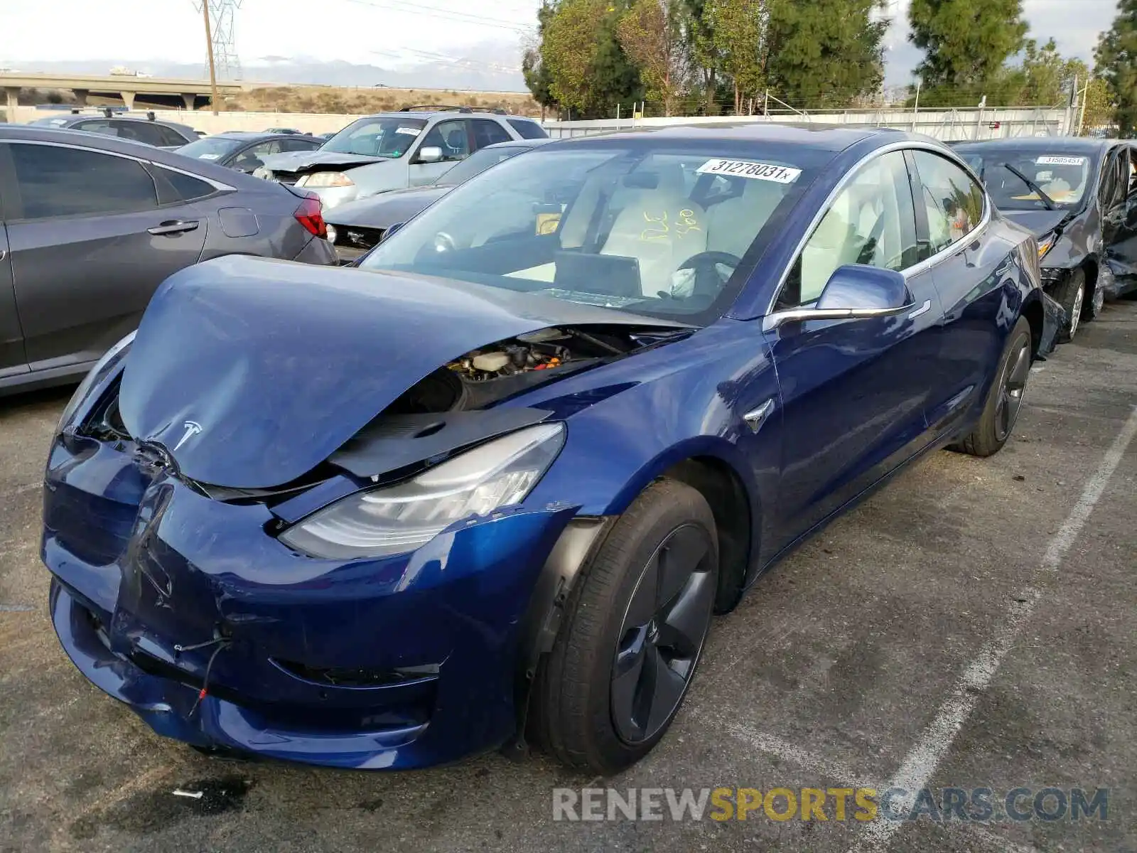 2 Photograph of a damaged car 5YJ3E1EB5KF192180 TESLA MODEL 3 2019