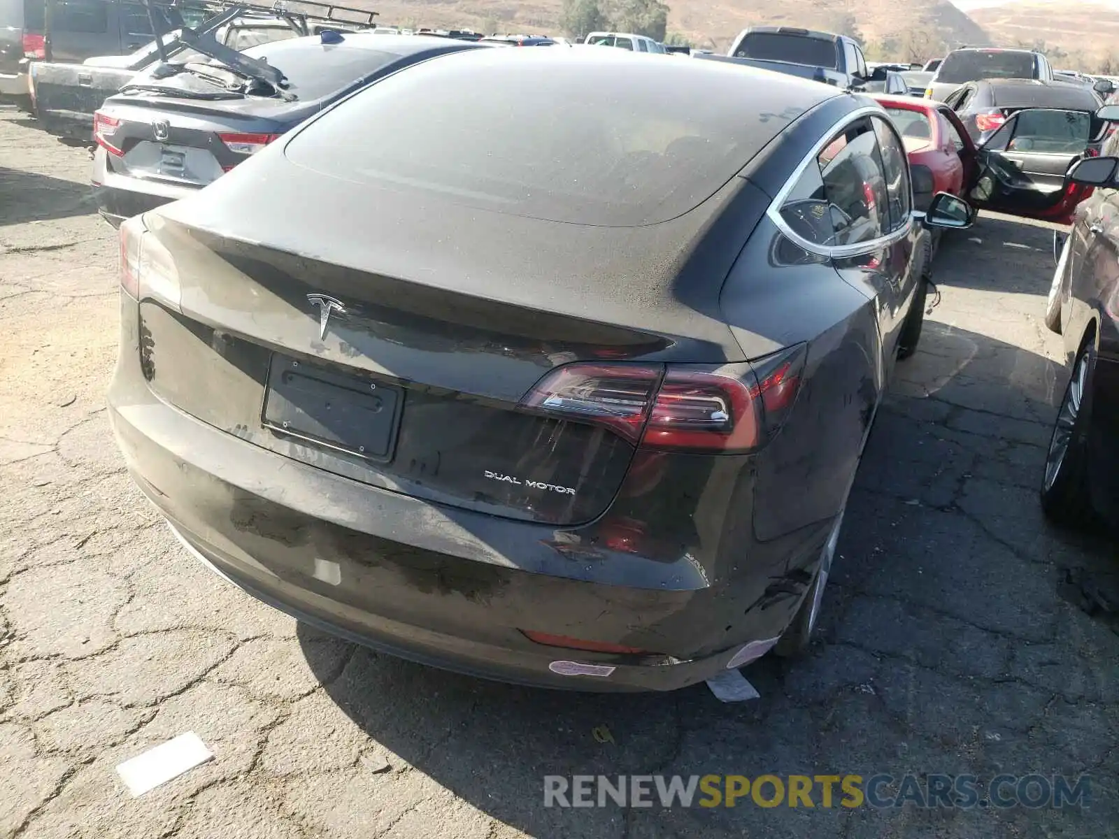 4 Photograph of a damaged car 5YJ3E1EB5KF388880 TESLA MODEL 3 2019