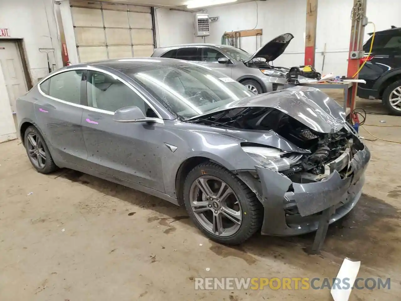 4 Photograph of a damaged car 5YJ3E1EB5KF389107 TESLA MODEL 3 2019