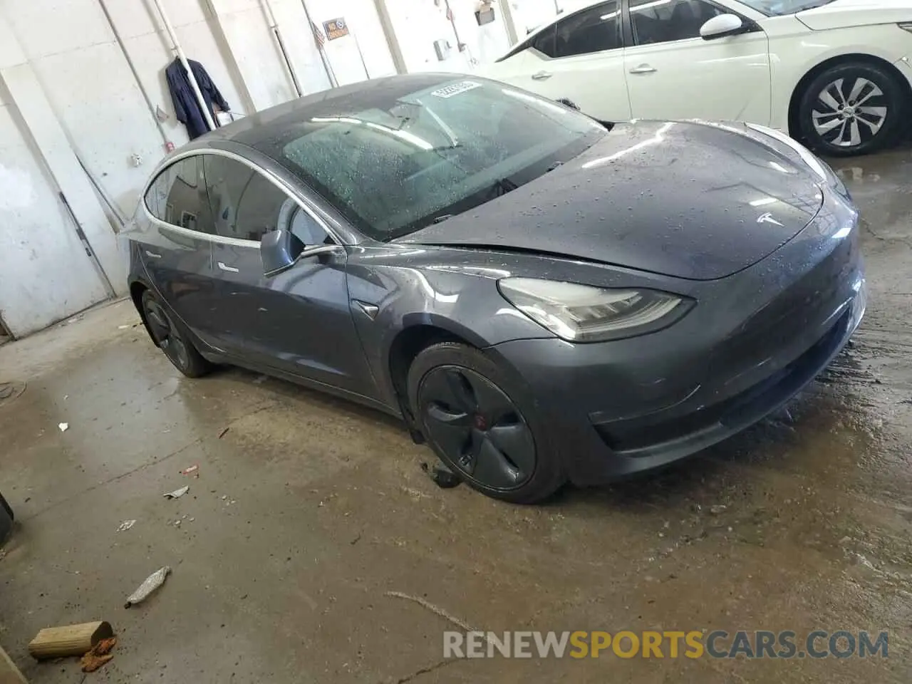 4 Photograph of a damaged car 5YJ3E1EB5KF453064 TESLA MODEL 3 2019