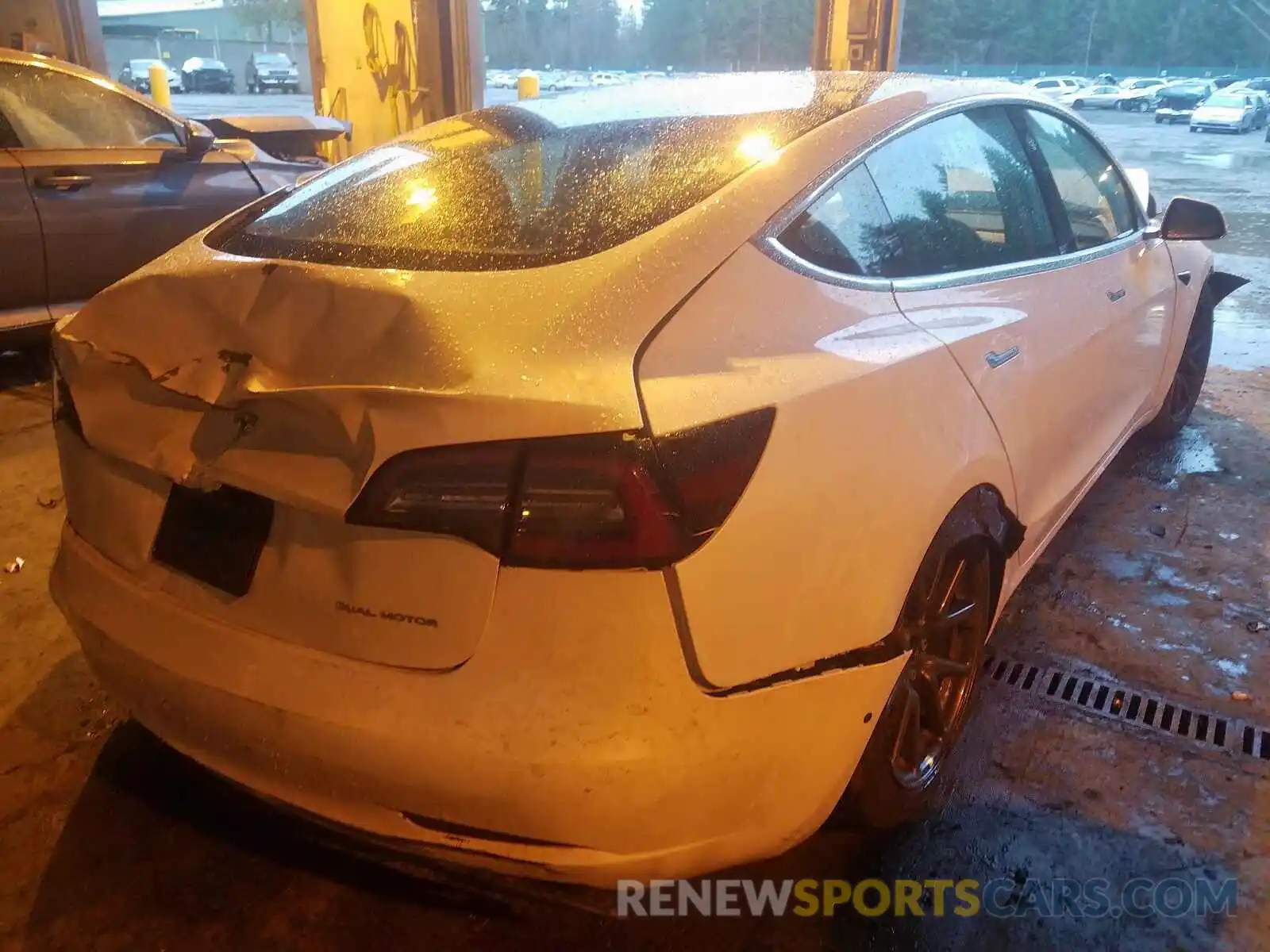 4 Photograph of a damaged car 5YJ3E1EB5KF494018 TESLA MODEL 3 2019