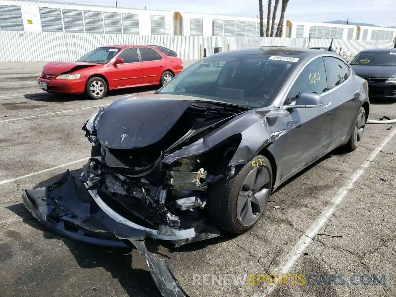 2 Photograph of a damaged car 5YJ3E1EB6KF209942 TESLA MODEL 3 2019