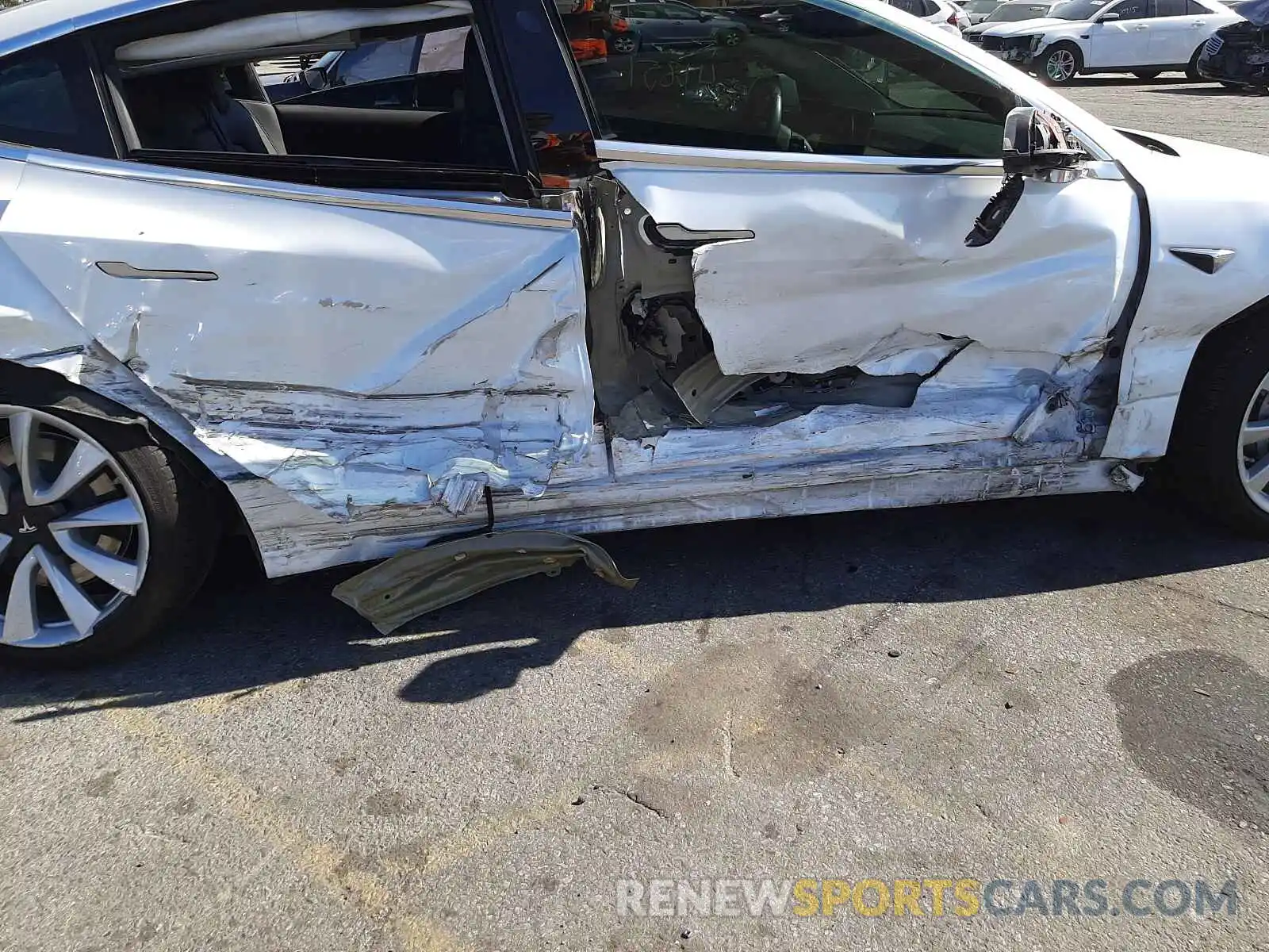 9 Photograph of a damaged car 5YJ3E1EB6KF390119 TESLA MODEL 3 2019