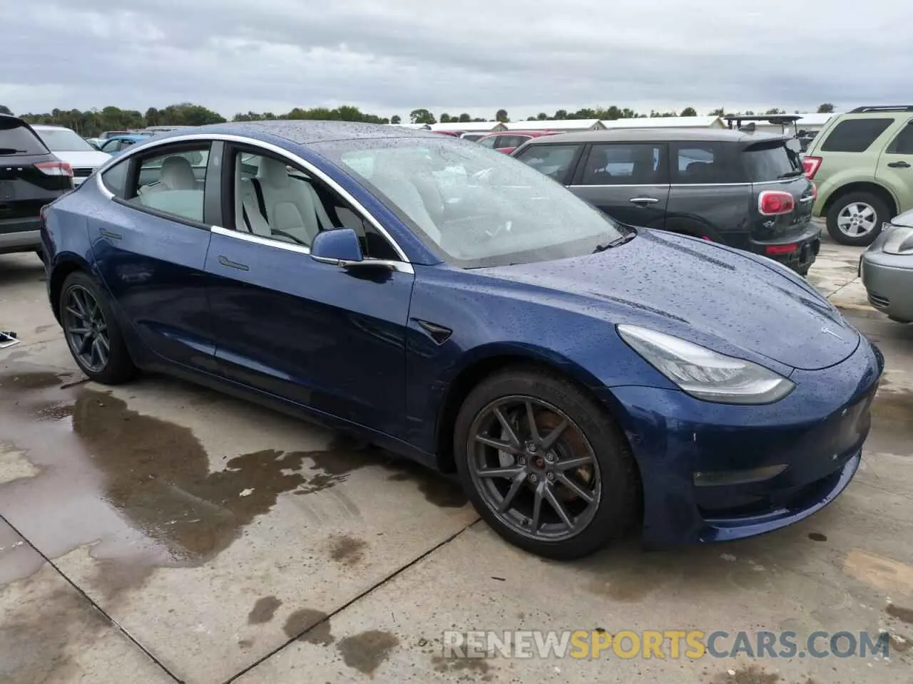 4 Photograph of a damaged car 5YJ3E1EB6KF512946 TESLA MODEL 3 2019