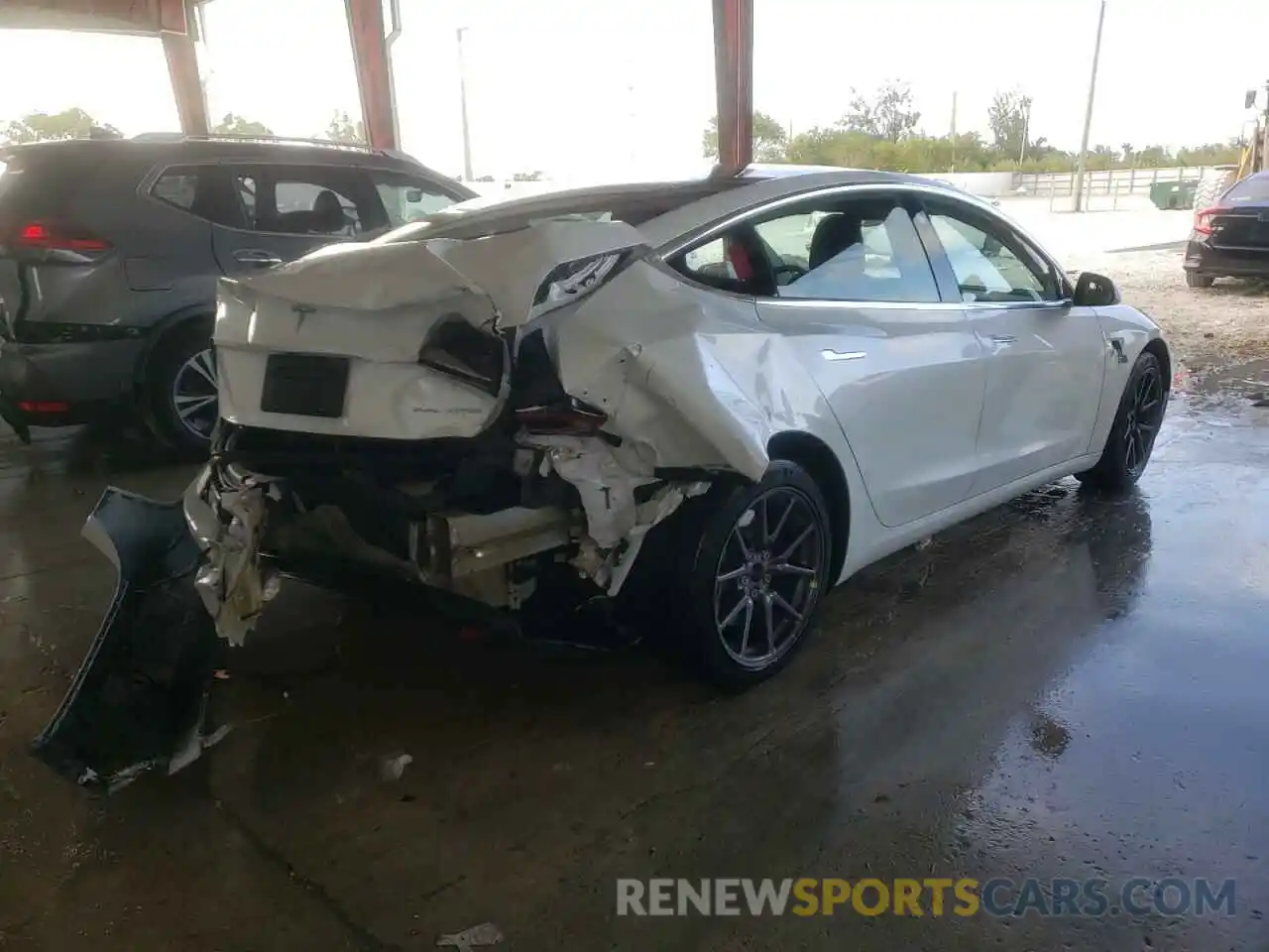 4 Photograph of a damaged car 5YJ3E1EB7KF191497 TESLA MODEL 3 2019