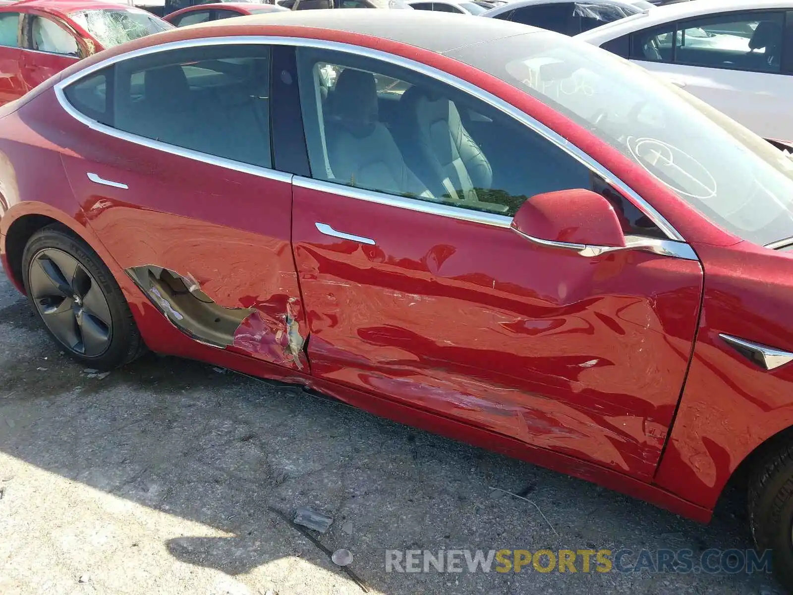 9 Photograph of a damaged car 5YJ3E1EB7KF387259 TESLA MODEL 3 2019