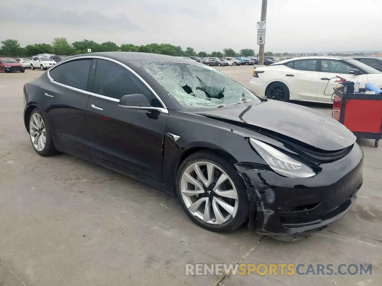 4 Photograph of a damaged car 5YJ3E1EB7KF388928 TESLA MODEL 3 2019