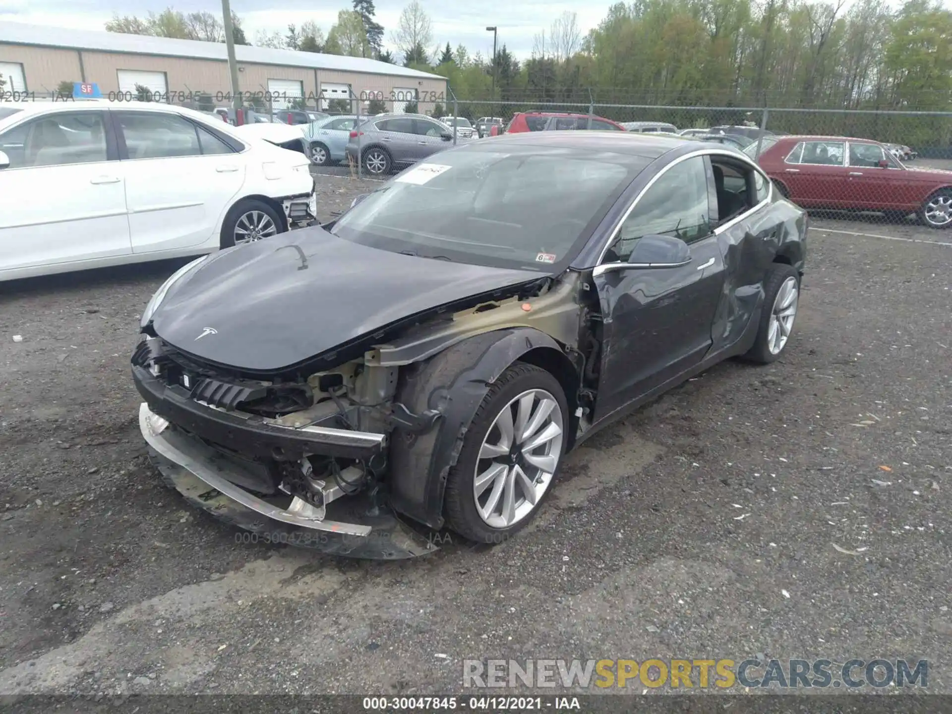 2 Photograph of a damaged car 5YJ3E1EB7KF389075 TESLA MODEL 3 2019