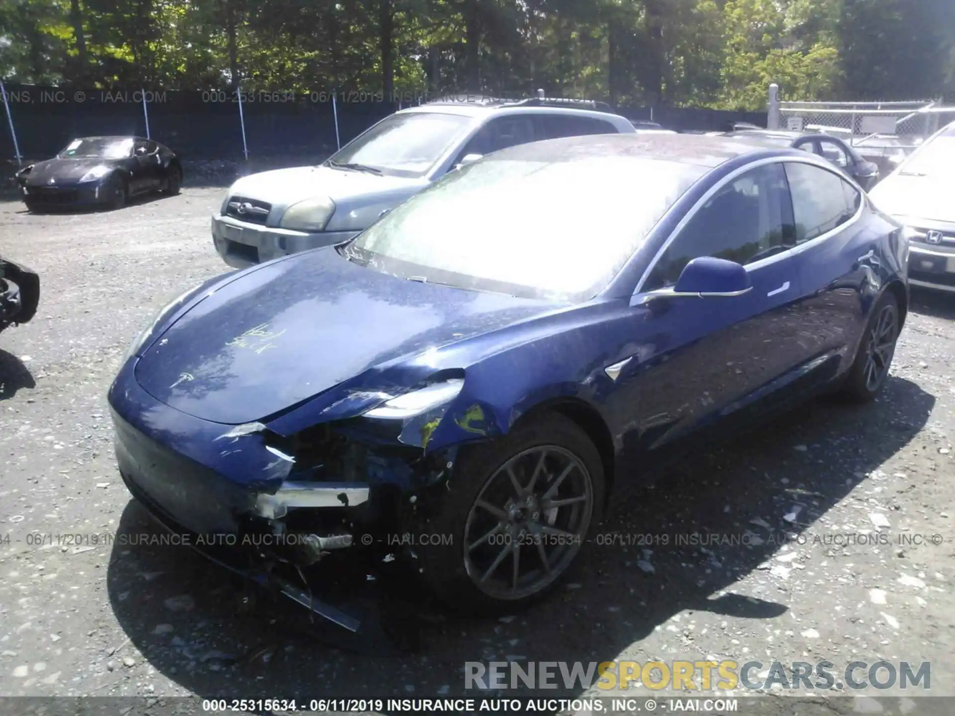 2 Photograph of a damaged car 5YJ3E1EB8KF193758 TESLA MODEL 3 2019