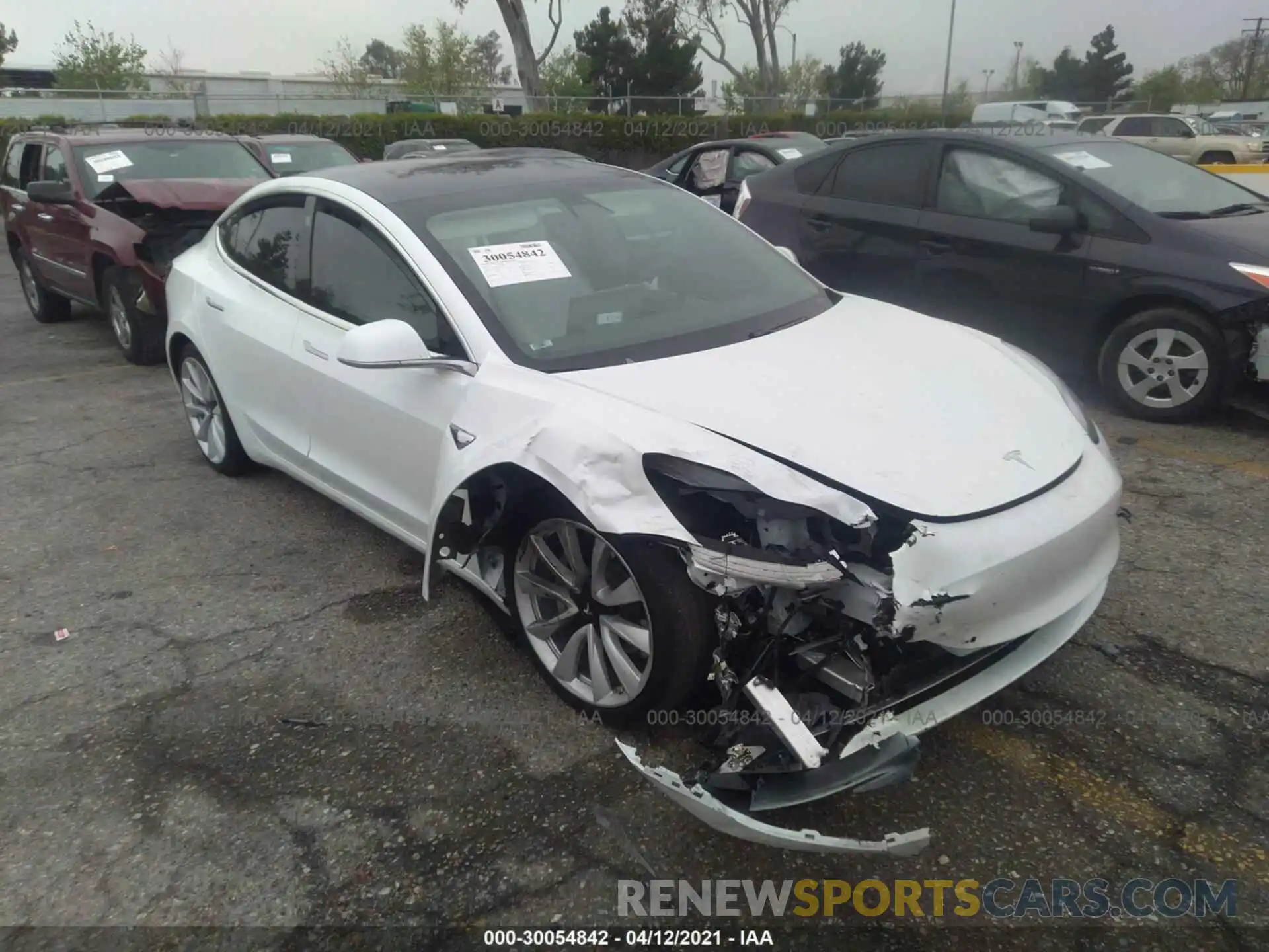 1 Photograph of a damaged car 5YJ3E1EB8KF421824 TESLA MODEL 3 2019