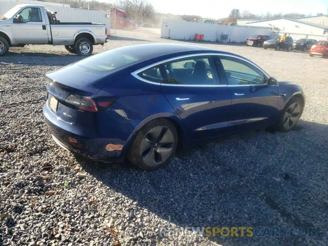 4 Photograph of a damaged car 5YJ3E1EB8KF497267 TESLA MODEL 3 2019