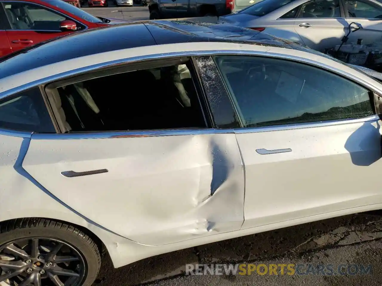 9 Photograph of a damaged car 5YJ3E1EB8KF510552 TESLA MODEL 3 2019