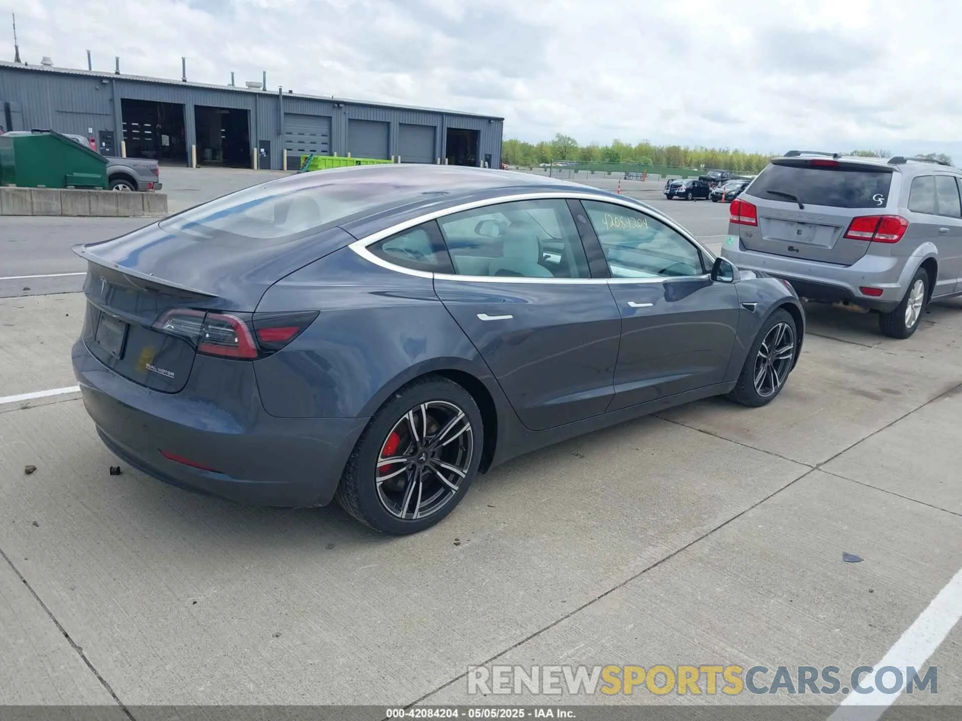 4 Photograph of a damaged car 5YJ3E1EB9KF230493 TESLA MODEL 3 2019