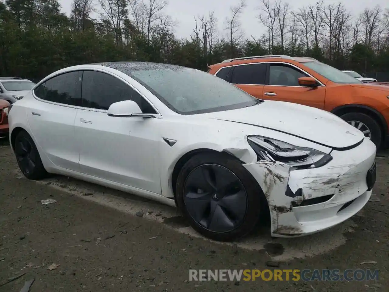 4 Photograph of a damaged car 5YJ3E1EB9KF388297 TESLA MODEL 3 2019