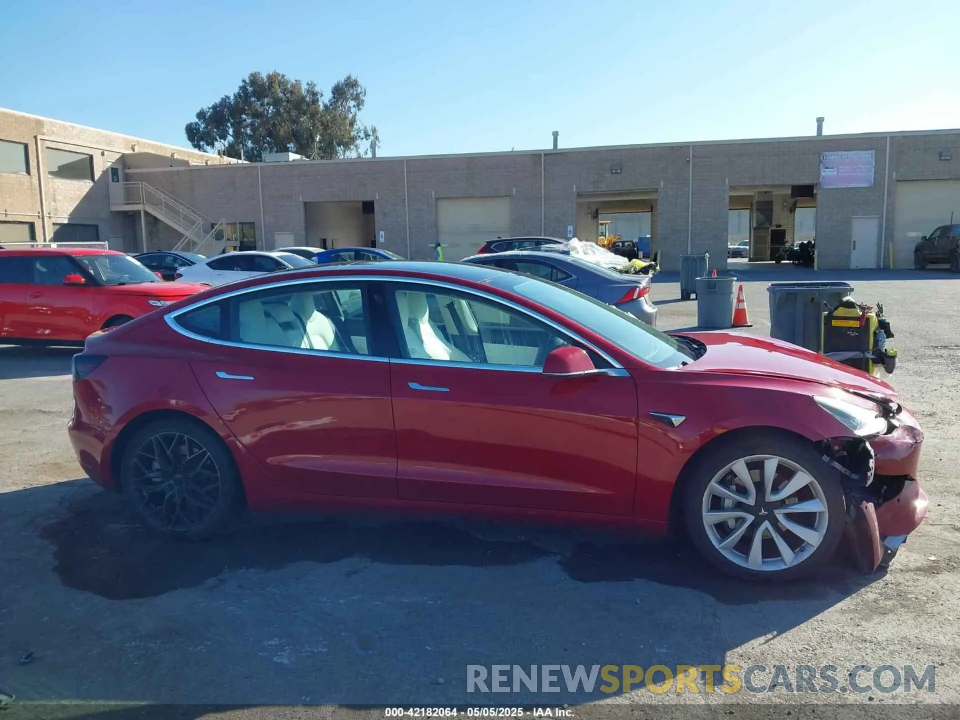 12 Photograph of a damaged car 5YJ3E1EB9KF421797 TESLA MODEL 3 2019