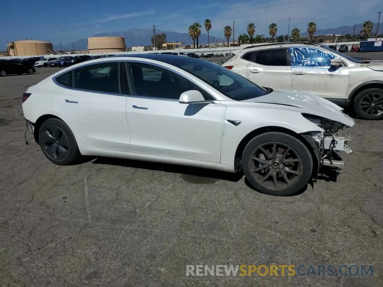 4 Photograph of a damaged car 5YJ3E1EB9KF436963 TESLA MODEL 3 2019
