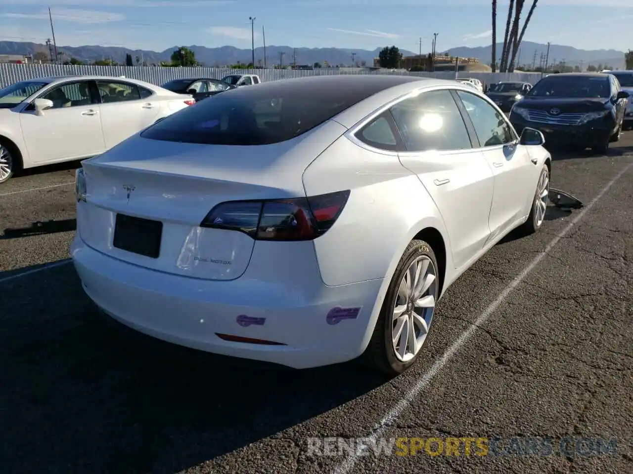 4 Photograph of a damaged car 5YJ3E1EB9KF437093 TESLA MODEL 3 2019