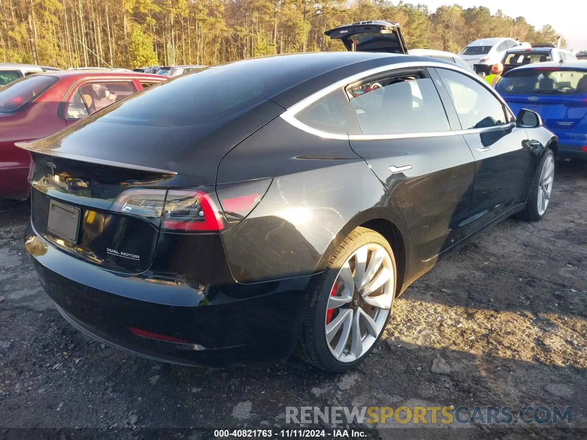 4 Photograph of a damaged car 5YJ3E1EB9KF438406 TESLA MODEL 3 2019