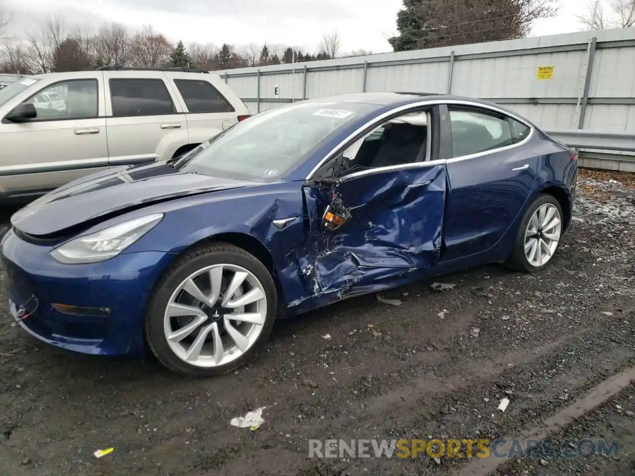 1 Photograph of a damaged car 5YJ3E1EBXKF389877 TESLA MODEL 3 2019