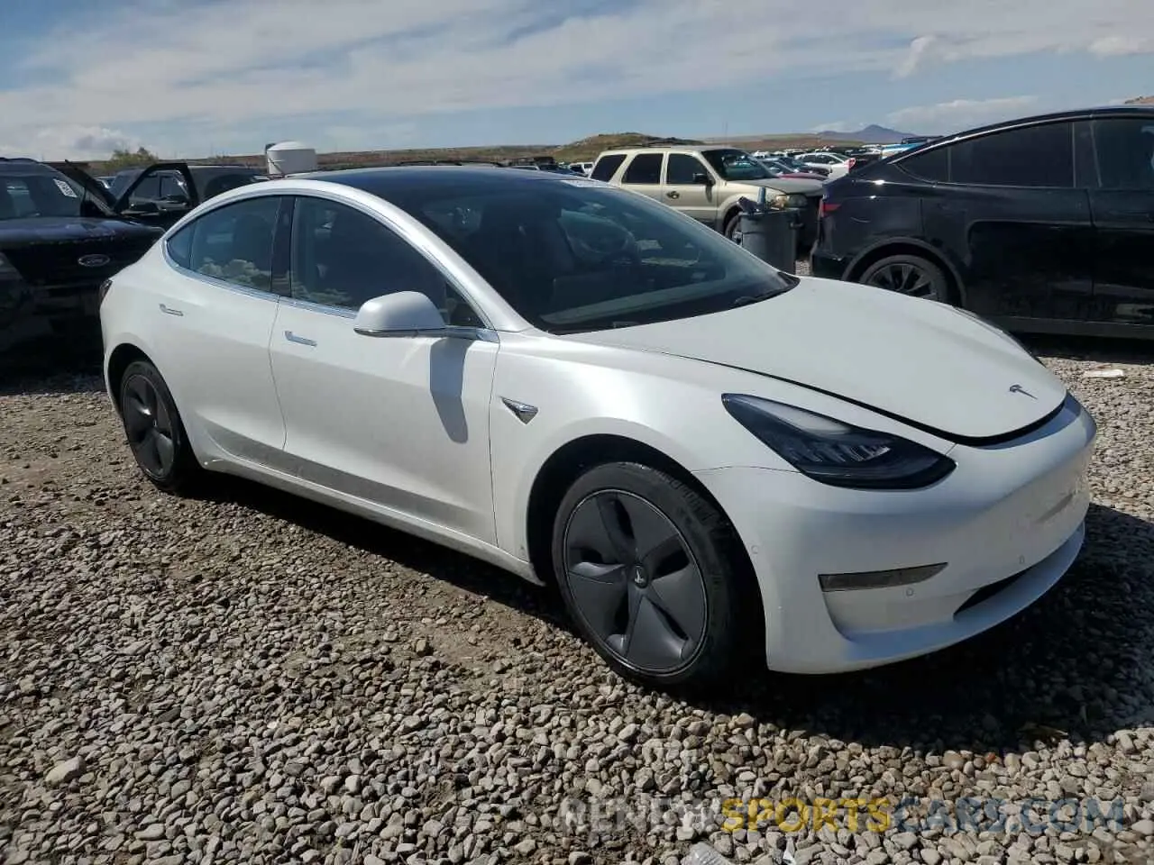 4 Photograph of a damaged car 5YJ3E1EBXKF494161 TESLA MODEL 3 2019