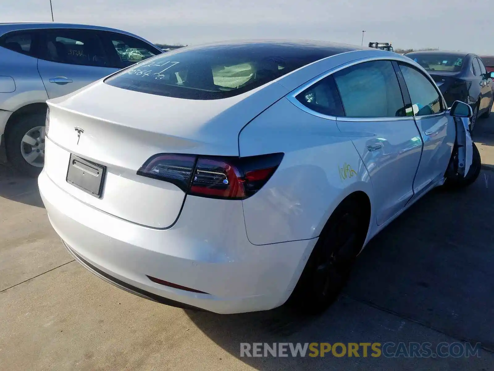 4 Photograph of a damaged car 5YJ3E1EA0LF597565 TESLA MODEL 3 2020