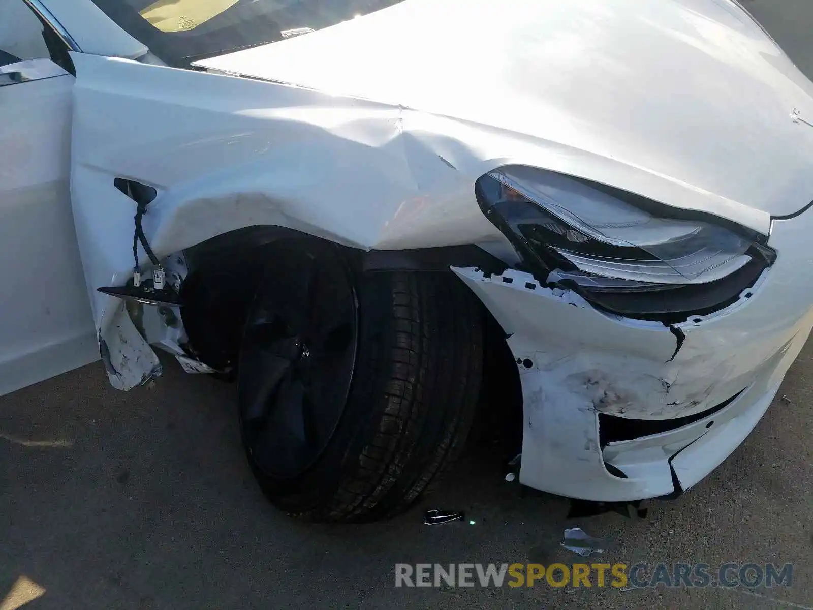 9 Photograph of a damaged car 5YJ3E1EA0LF597565 TESLA MODEL 3 2020