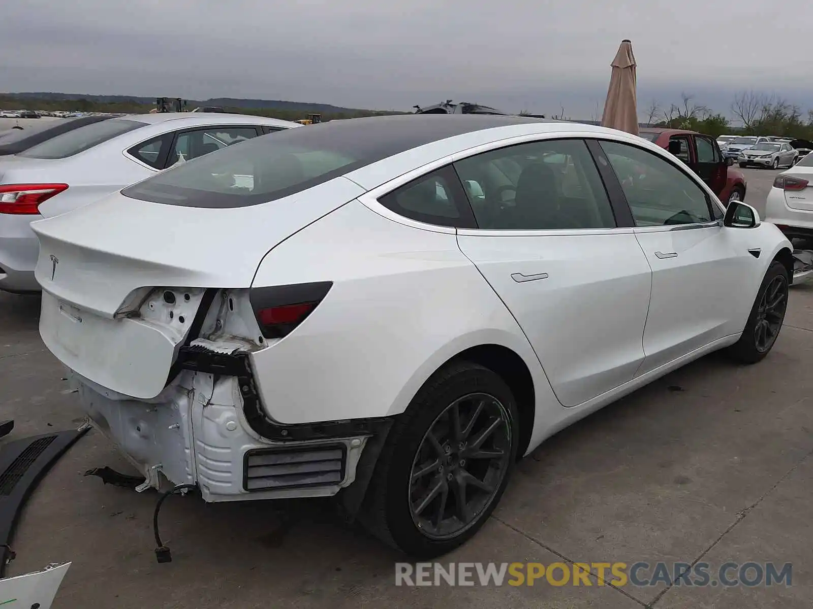 4 Photograph of a damaged car 5YJ3E1EA0LF597646 TESLA MODEL 3 2020