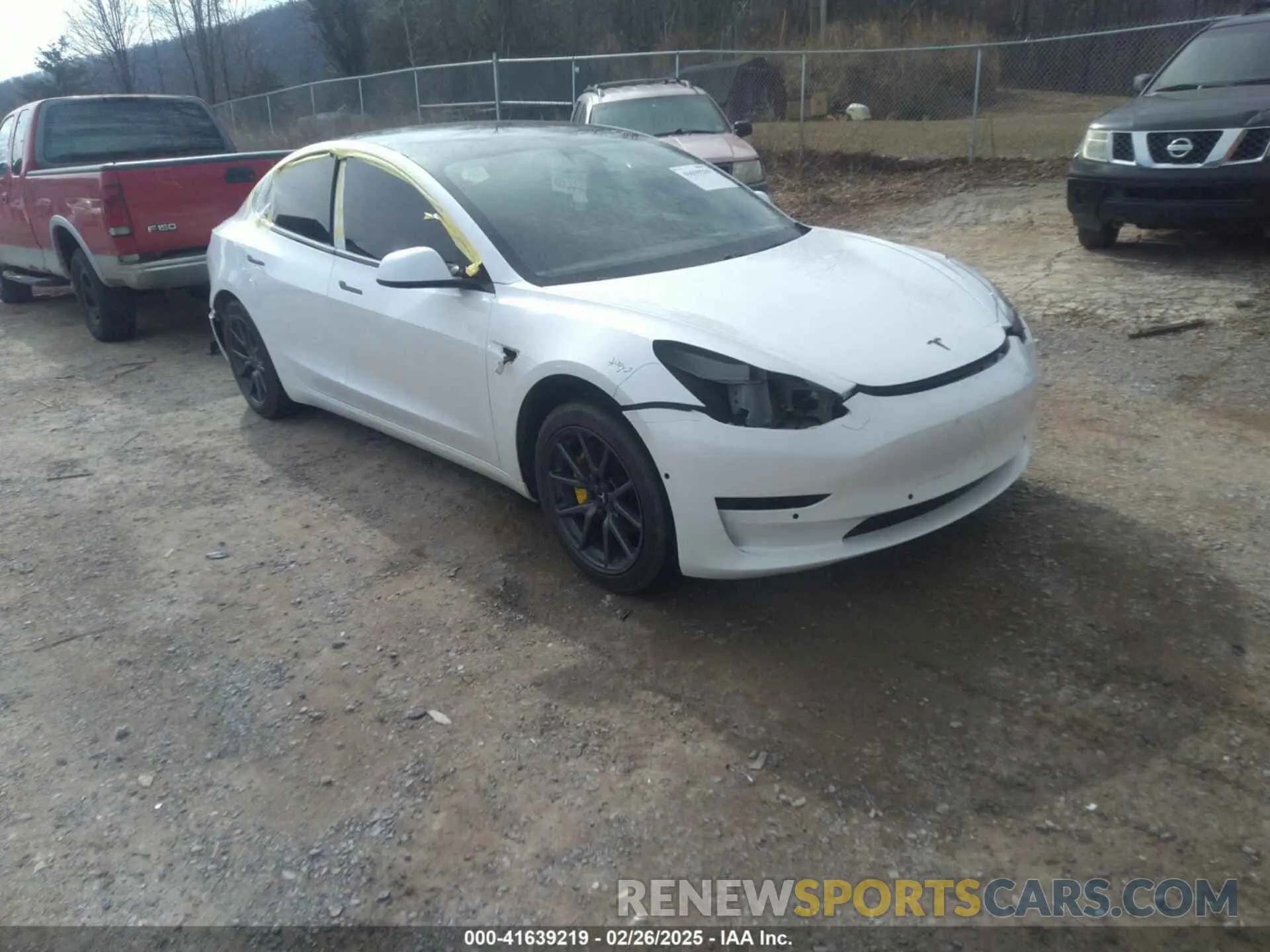 1 Photograph of a damaged car 5YJ3E1EA0LF597839 TESLA MODEL 3 2020