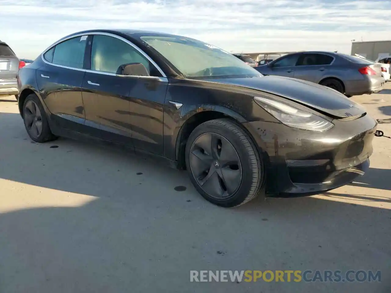 4 Photograph of a damaged car 5YJ3E1EA0LF598196 TESLA MODEL 3 2020