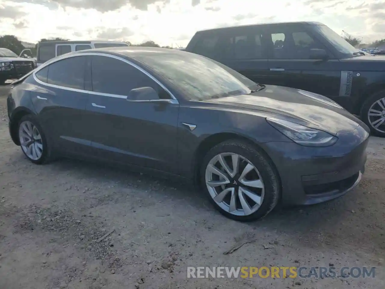 4 Photograph of a damaged car 5YJ3E1EA0LF598490 TESLA MODEL 3 2020