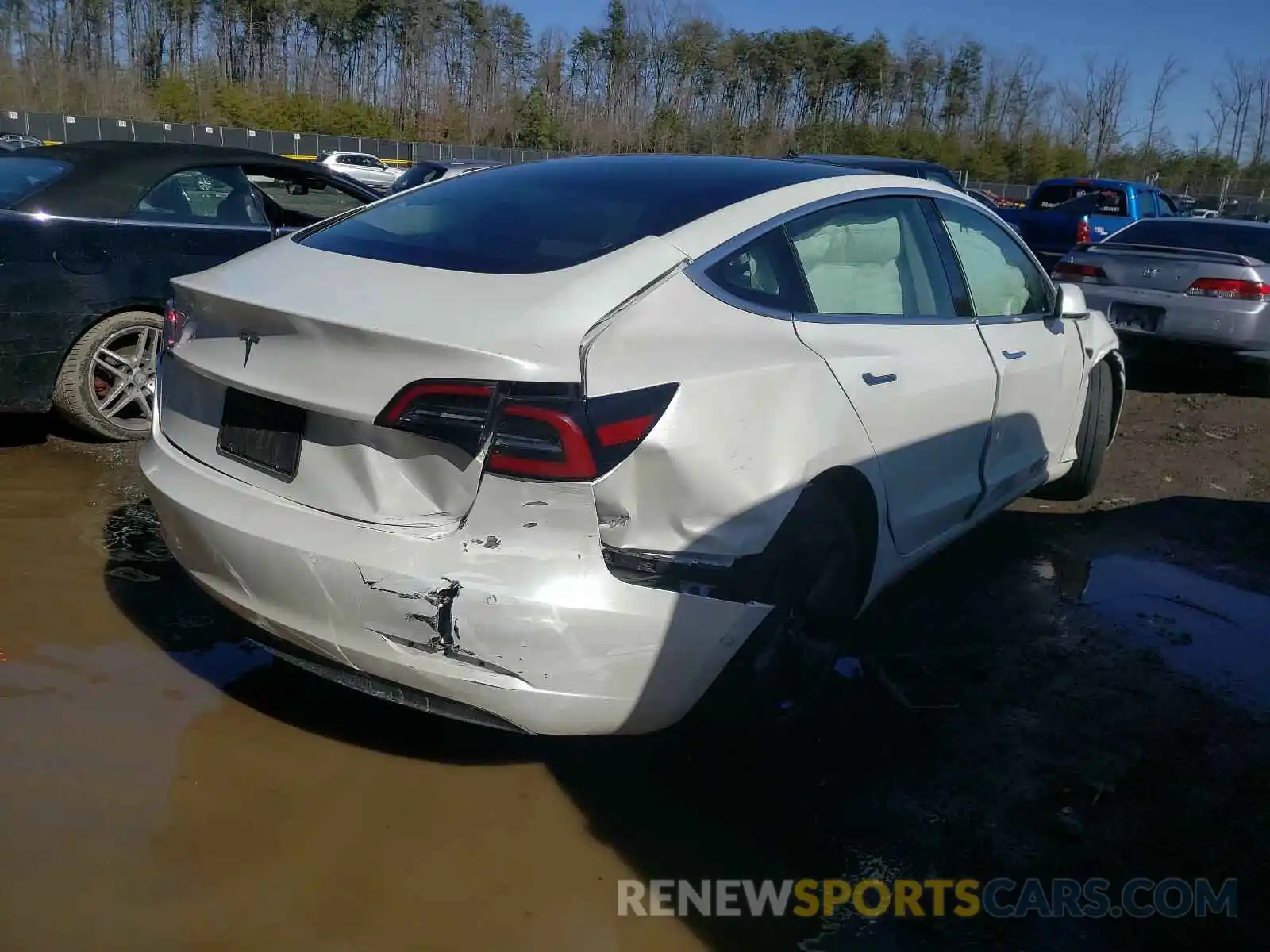 4 Photograph of a damaged car 5YJ3E1EA0LF613053 TESLA MODEL 3 2020