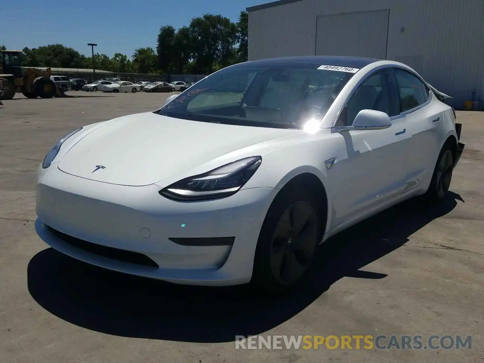 2 Photograph of a damaged car 5YJ3E1EA0LF615403 TESLA MODEL 3 2020