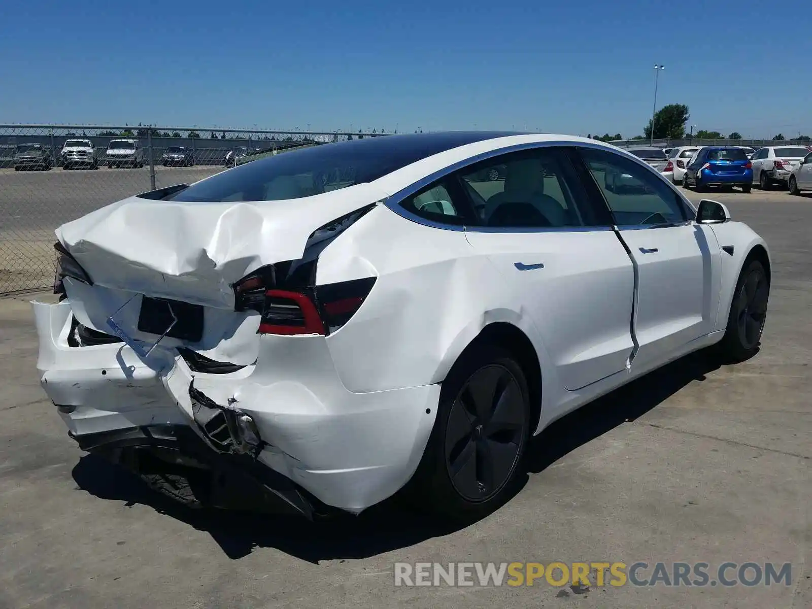 4 Photograph of a damaged car 5YJ3E1EA0LF615403 TESLA MODEL 3 2020