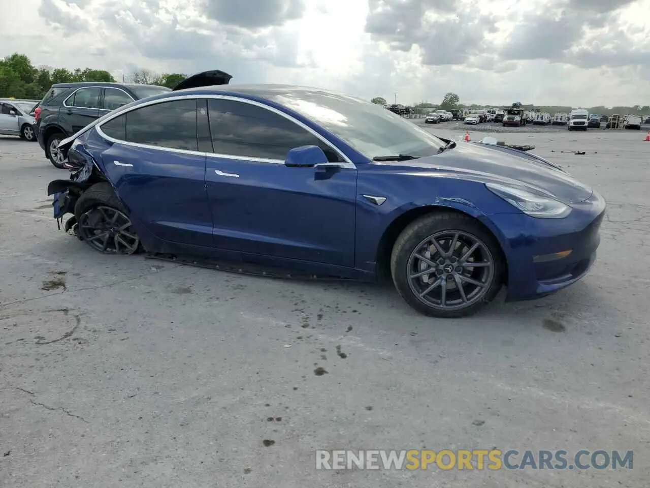 4 Photograph of a damaged car 5YJ3E1EA0LF631066 TESLA MODEL 3 2020