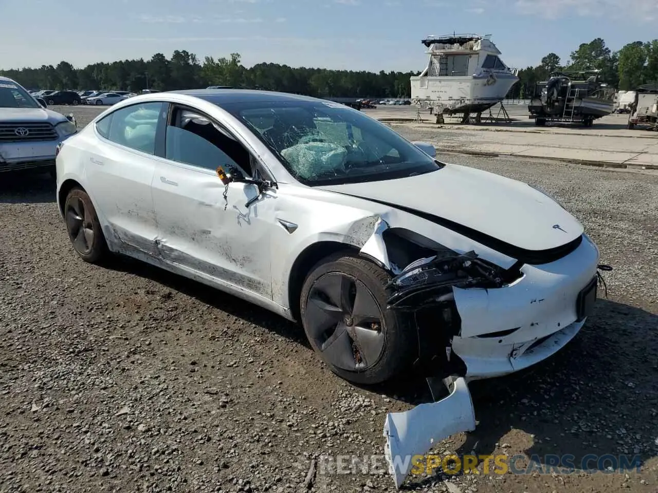 4 Photograph of a damaged car 5YJ3E1EA0LF631844 TESLA MODEL 3 2020
