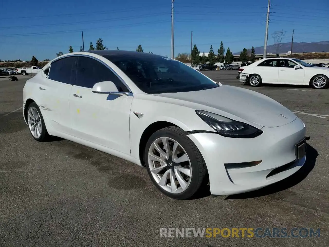 4 Photograph of a damaged car 5YJ3E1EA0LF634307 TESLA MODEL 3 2020