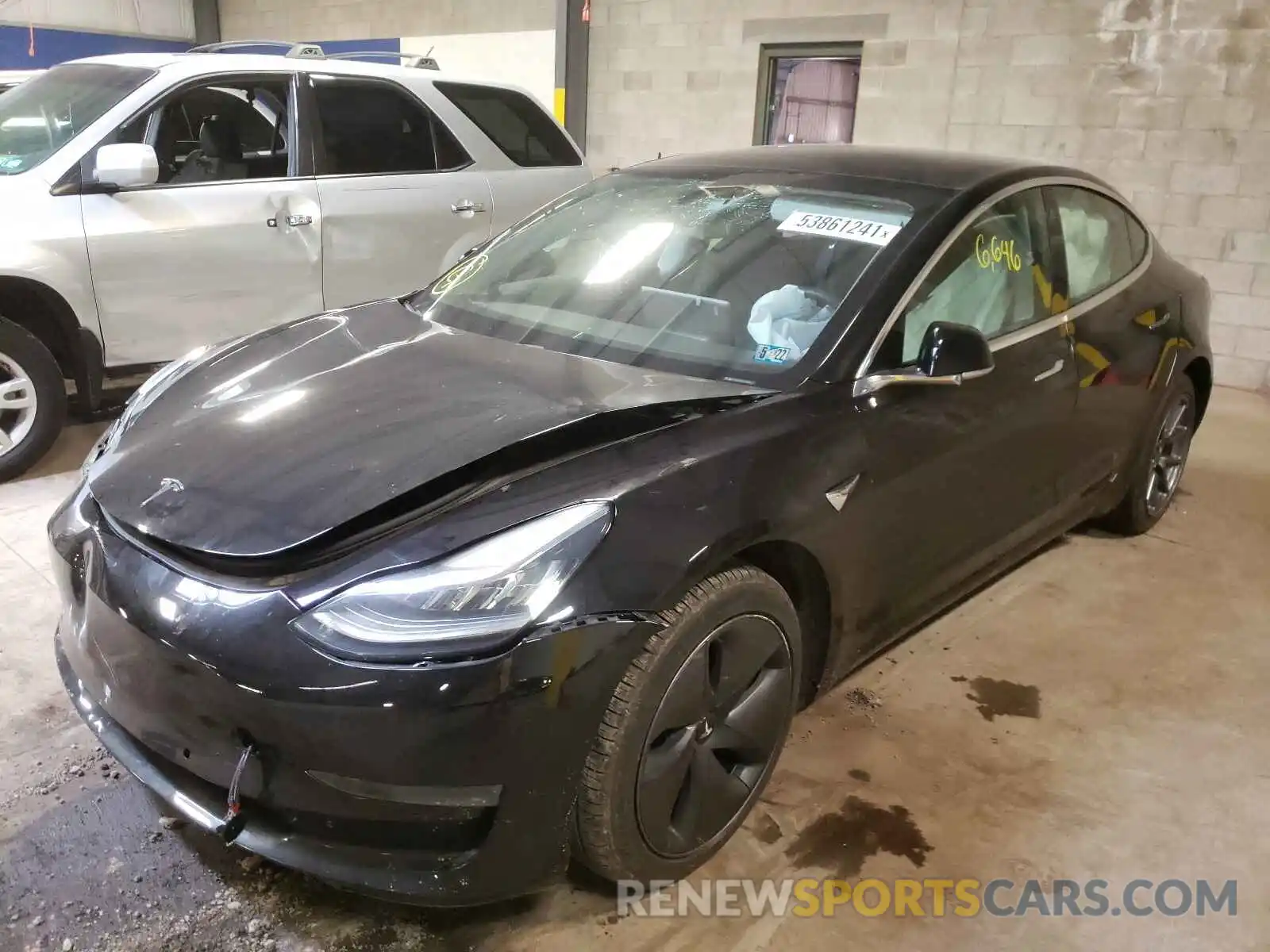 2 Photograph of a damaged car 5YJ3E1EA0LF643847 TESLA MODEL 3 2020