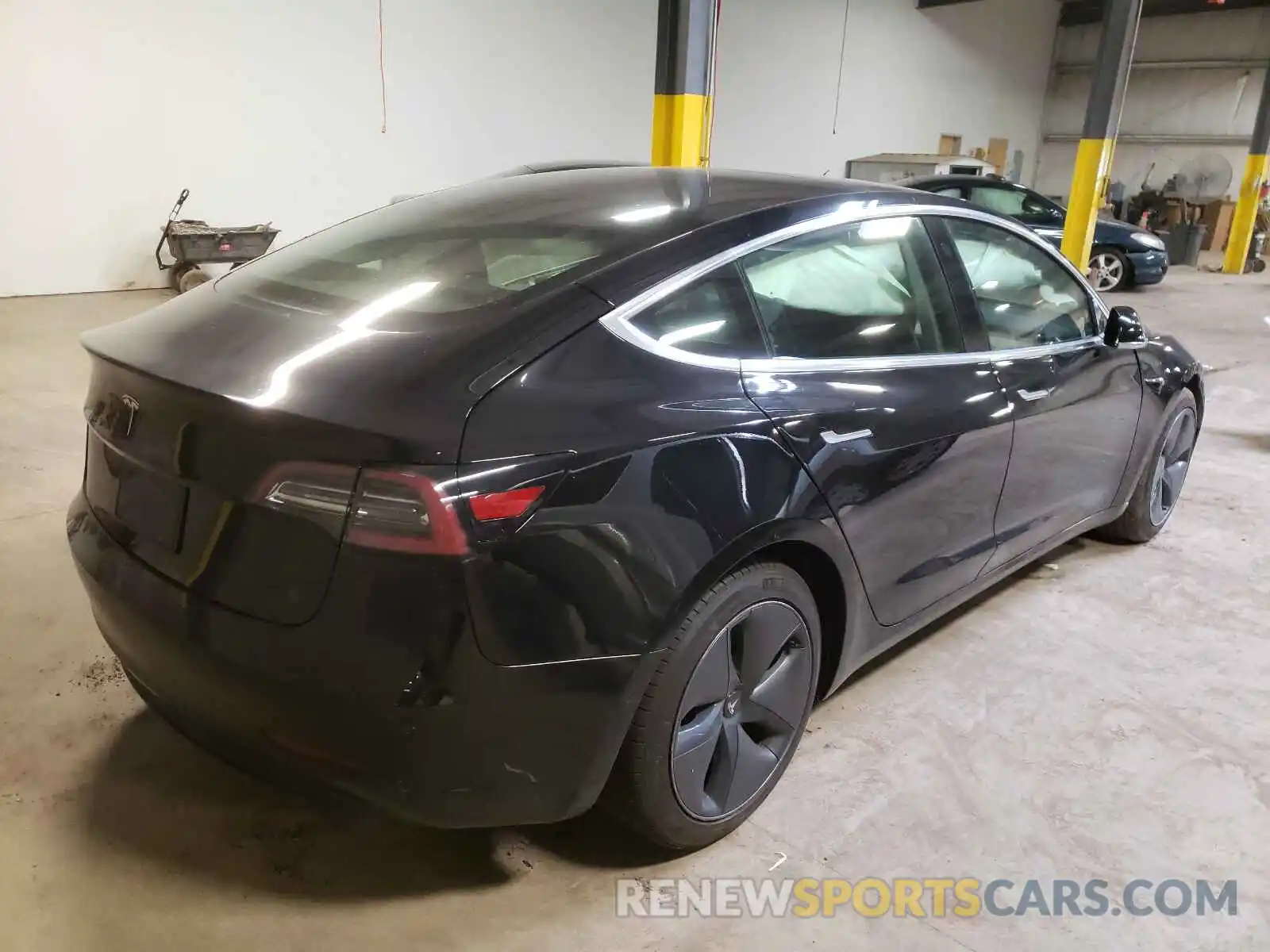 4 Photograph of a damaged car 5YJ3E1EA0LF643847 TESLA MODEL 3 2020