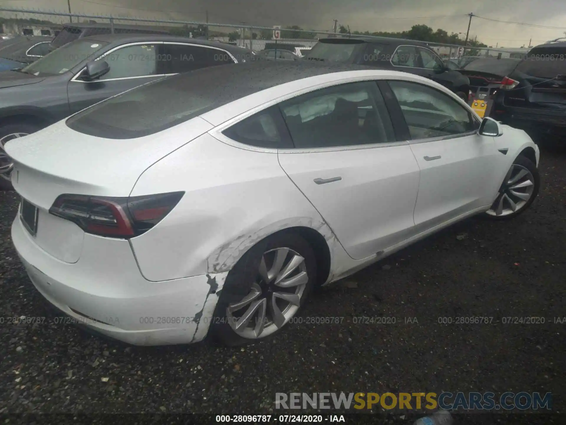 4 Photograph of a damaged car 5YJ3E1EA0LF661569 TESLA MODEL 3 2020