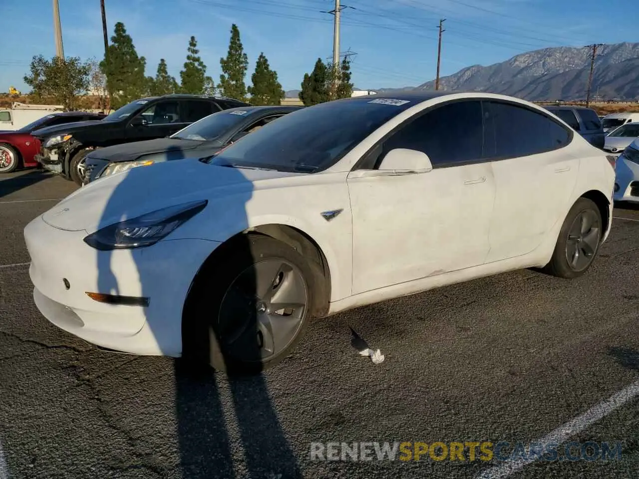 1 Photograph of a damaged car 5YJ3E1EA0LF703593 TESLA MODEL 3 2020