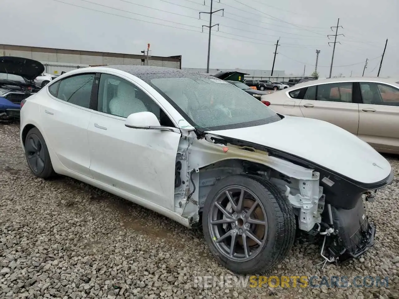 4 Photograph of a damaged car 5YJ3E1EA0LF710043 TESLA MODEL 3 2020