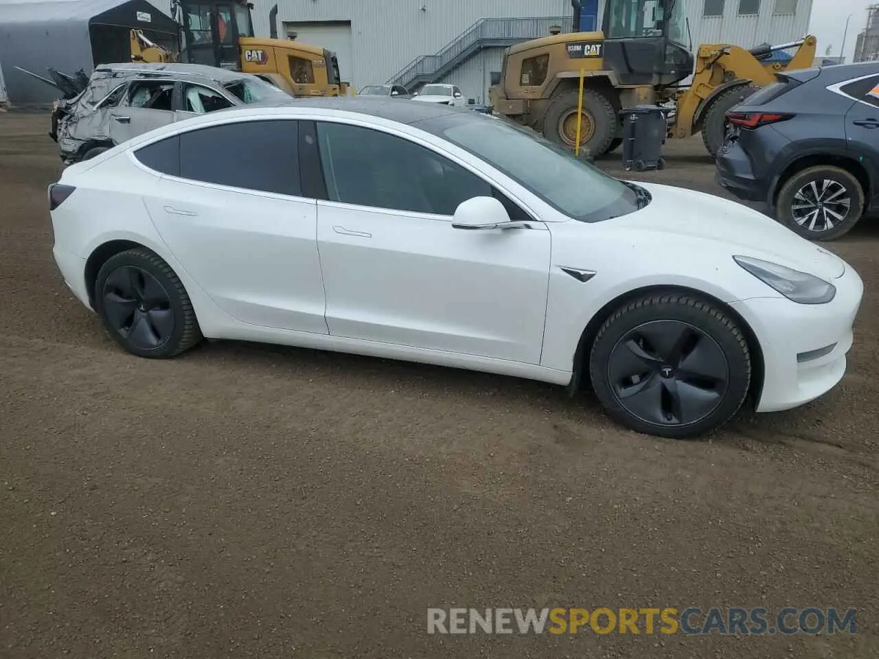 4 Photograph of a damaged car 5YJ3E1EA0LF715713 TESLA MODEL 3 2020