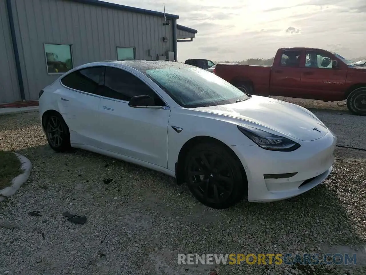 4 Photograph of a damaged car 5YJ3E1EA0LF737601 TESLA MODEL 3 2020